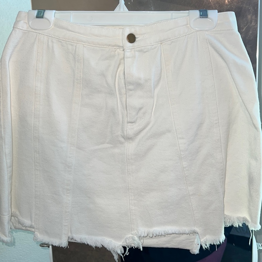 White distressed Denim skirt.